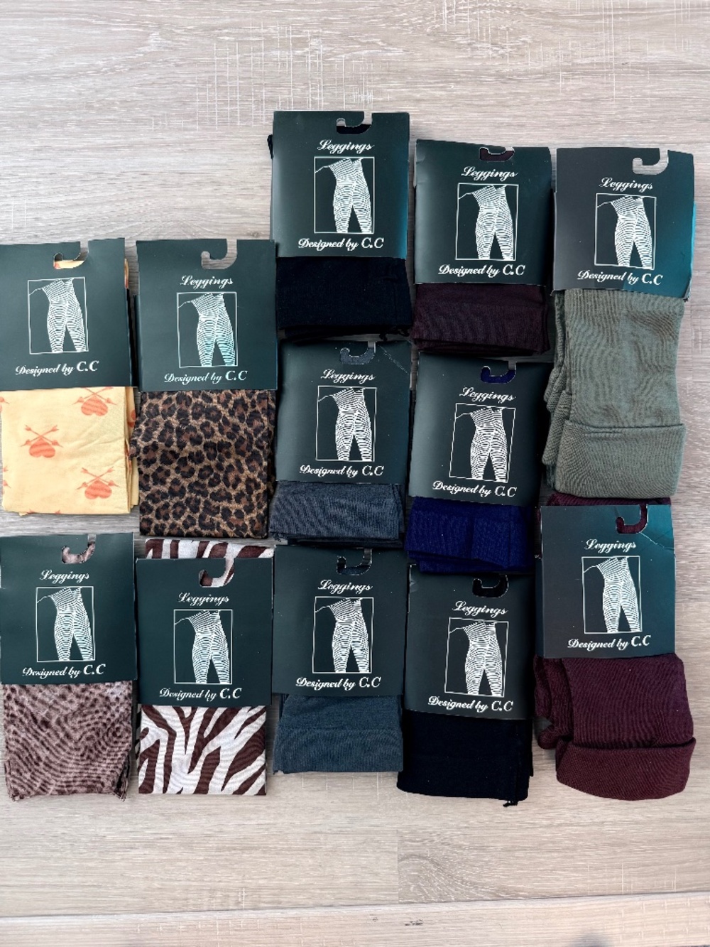 Lot of 12 OS leggings Designed by C.C Animal prints gray black green yellow